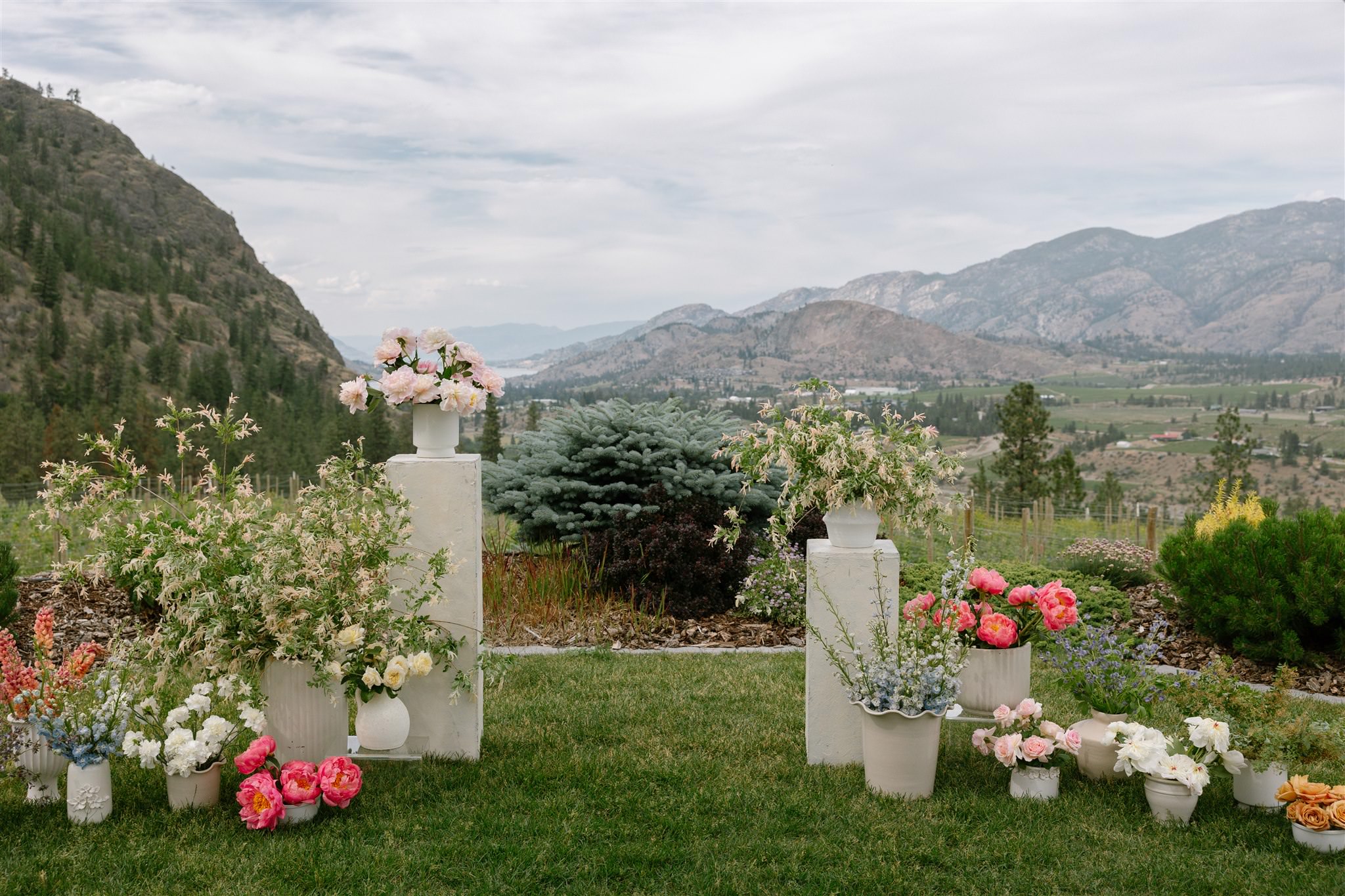 ceremony set up in front of mountains in the Okanagan